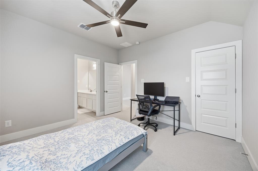 5805 Heatherwood Loop Sachse, TX 75048 - Photo 31 of 39 a bedroom with a workspace