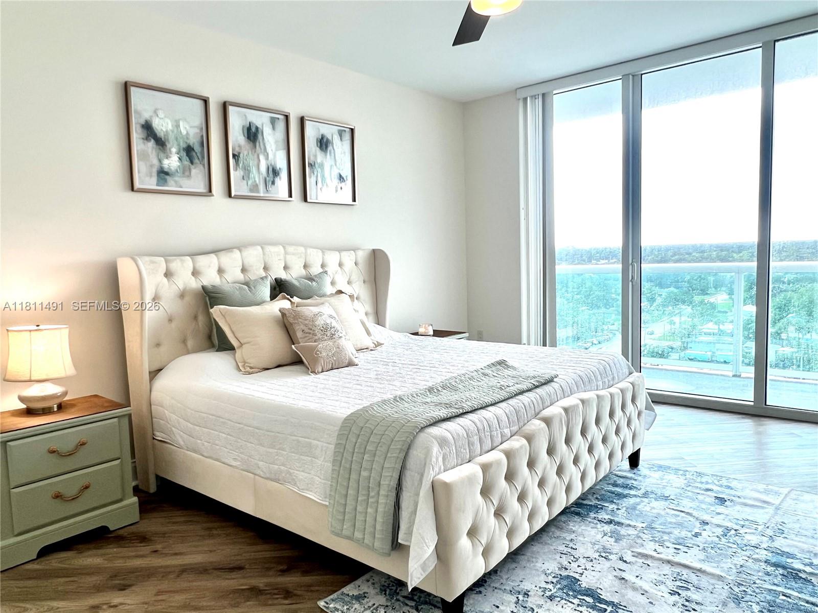231 Riverside Drive, Unit 1210 Daytona Beach, FL 32117 - Photo 18 of 70 a bed sitting in a bedroom next to a window