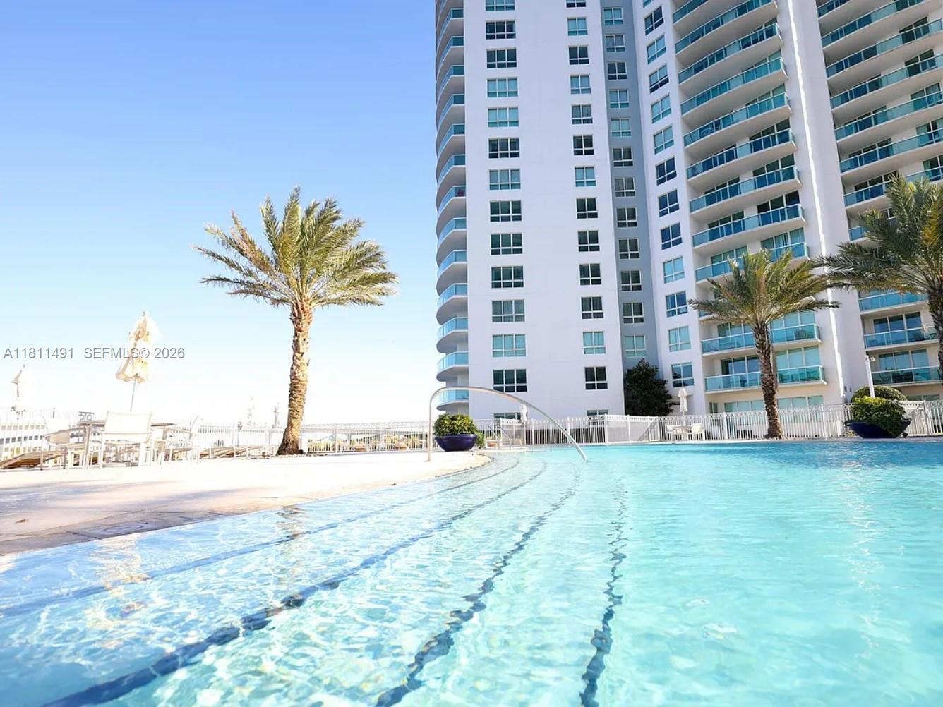 231 Riverside Drive, Unit 1210 Daytona Beach, FL 32117 - Photo 3 of 70 a view of a building with a street