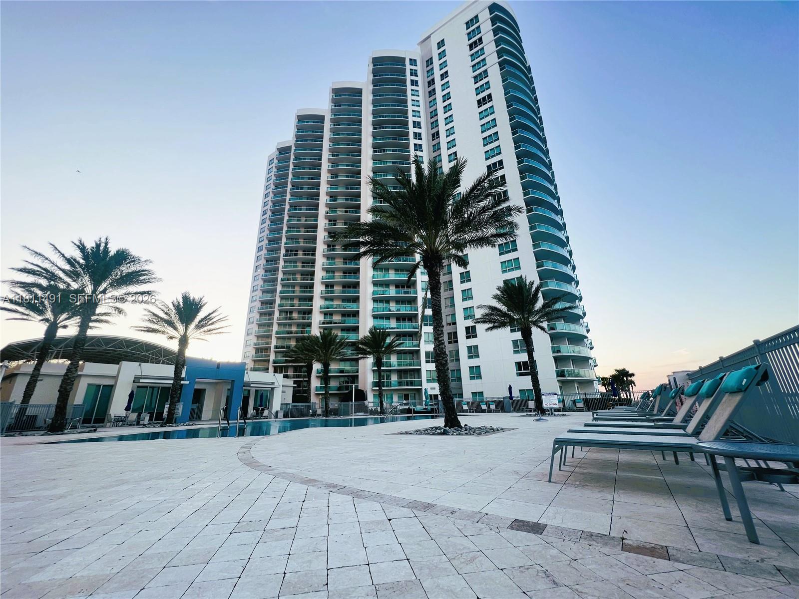 231 Riverside Drive, Unit 1210 Daytona Beach, FL 32117 - Photo 41 of 70 a view of a tall white building