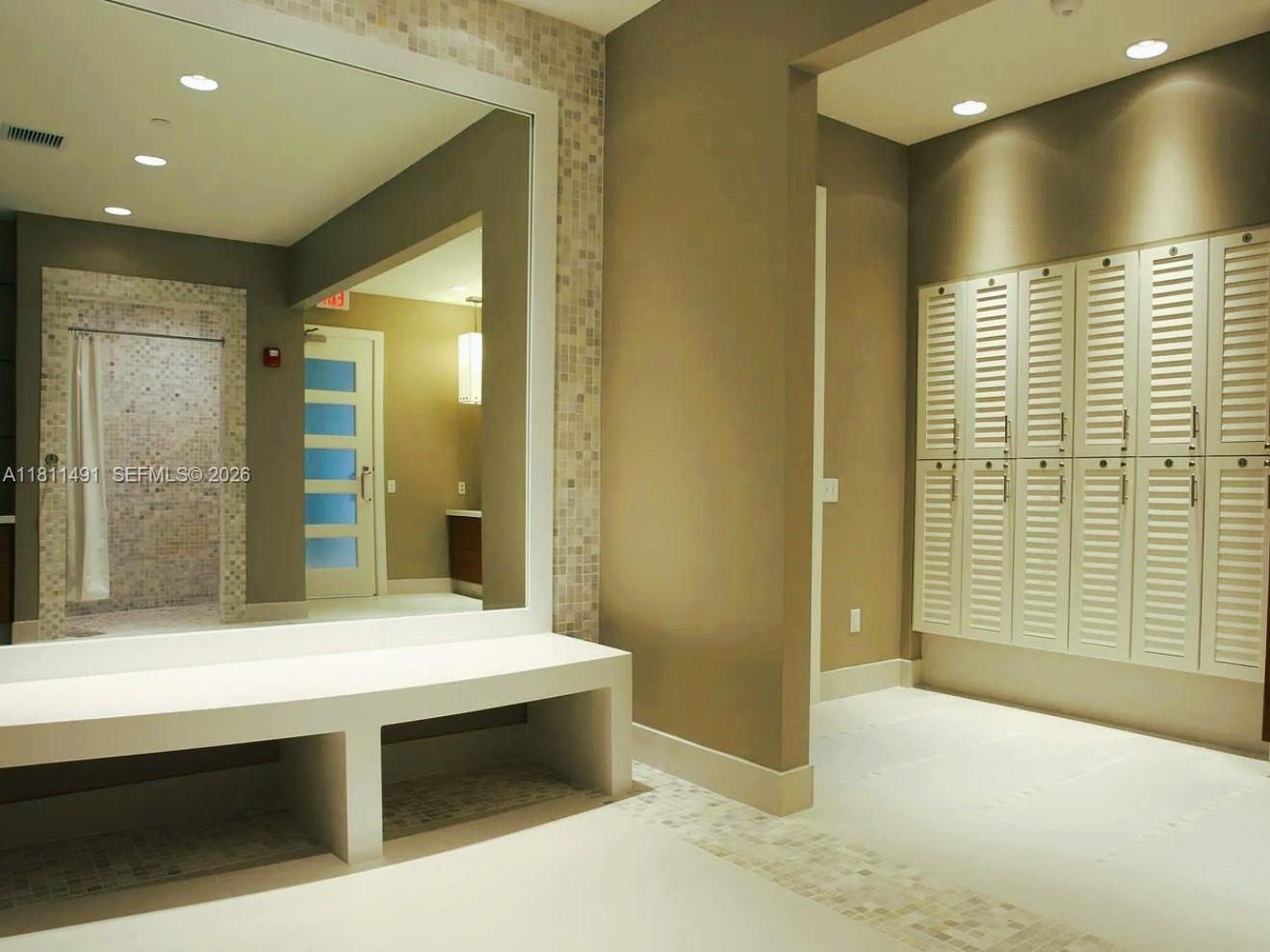 231 Riverside Drive, Unit 1210 Daytona Beach, FL 32117 - Photo 53 of 70 a bathroom with a sink and a mirror