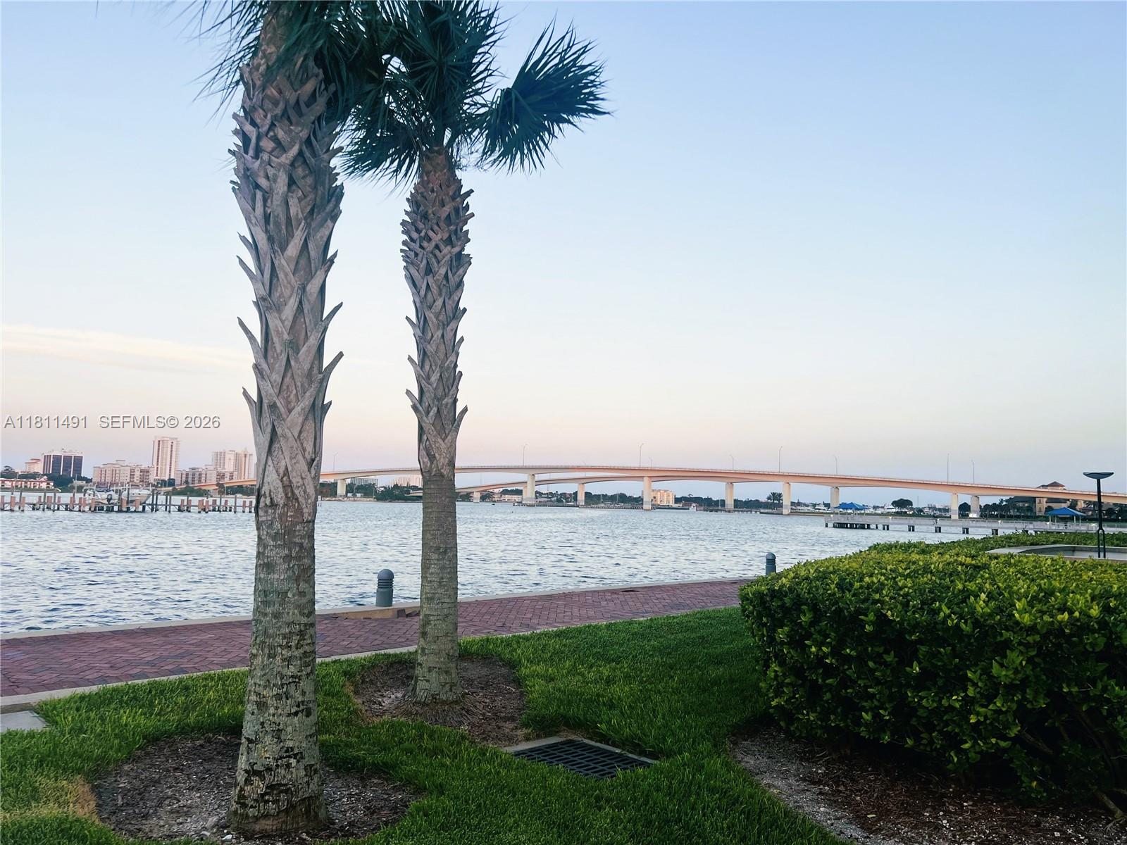 231 Riverside Drive, Unit 1210 Daytona Beach, FL 32117 - Photo 65 of 70 a view of a lake with a beach