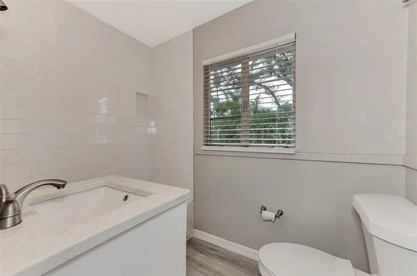 a bathroom with a sink and a toilet