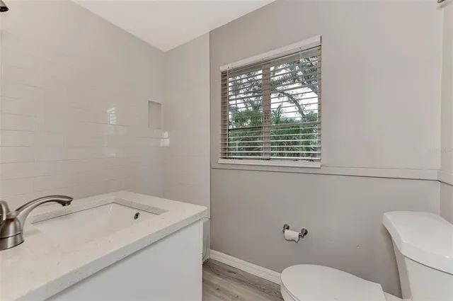 a bathroom with a sink and a toilet