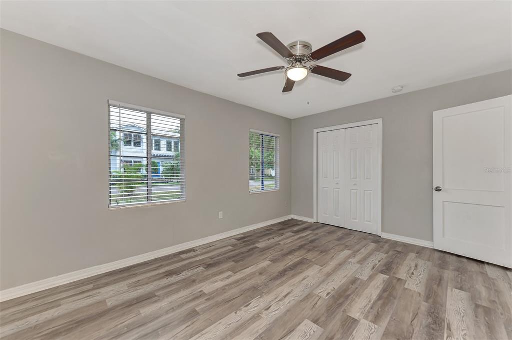 1891 Prospect Street Sarasota, FL 34239 - Photo 22 of 35 a view of a big room with wooden floor and windows in a room
