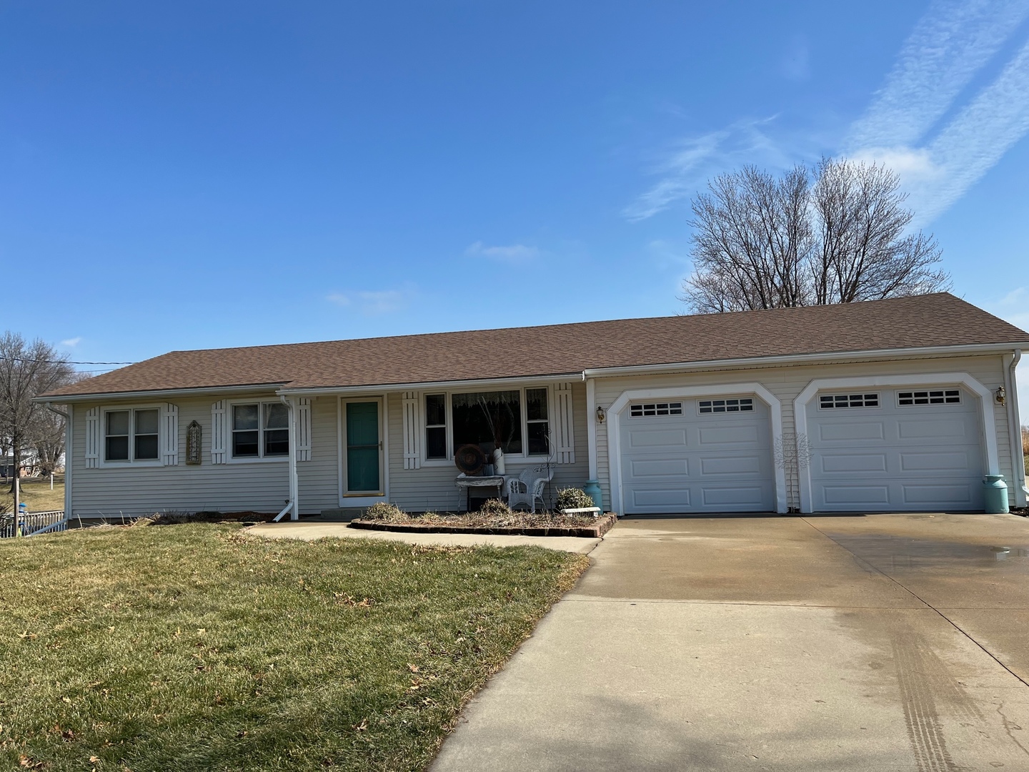 15750 Bishop Road Morrison, IL 61270 - Photo 1 of 31 a front view of house with yard and trees in the background