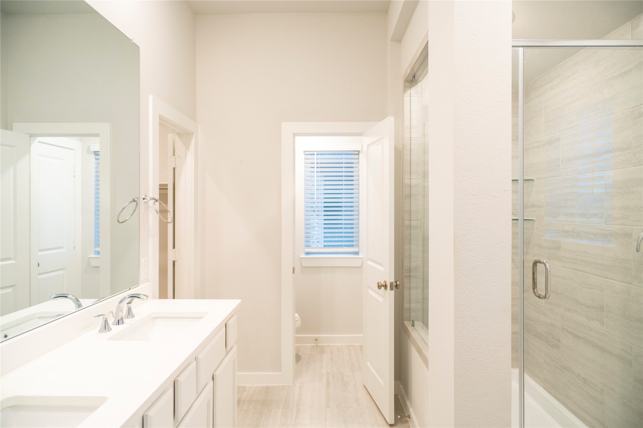 6519 Bramble Cv Lane Fulshear, TX 77441 - Photo 20 of 29 a bathroom with a sink and a mirror