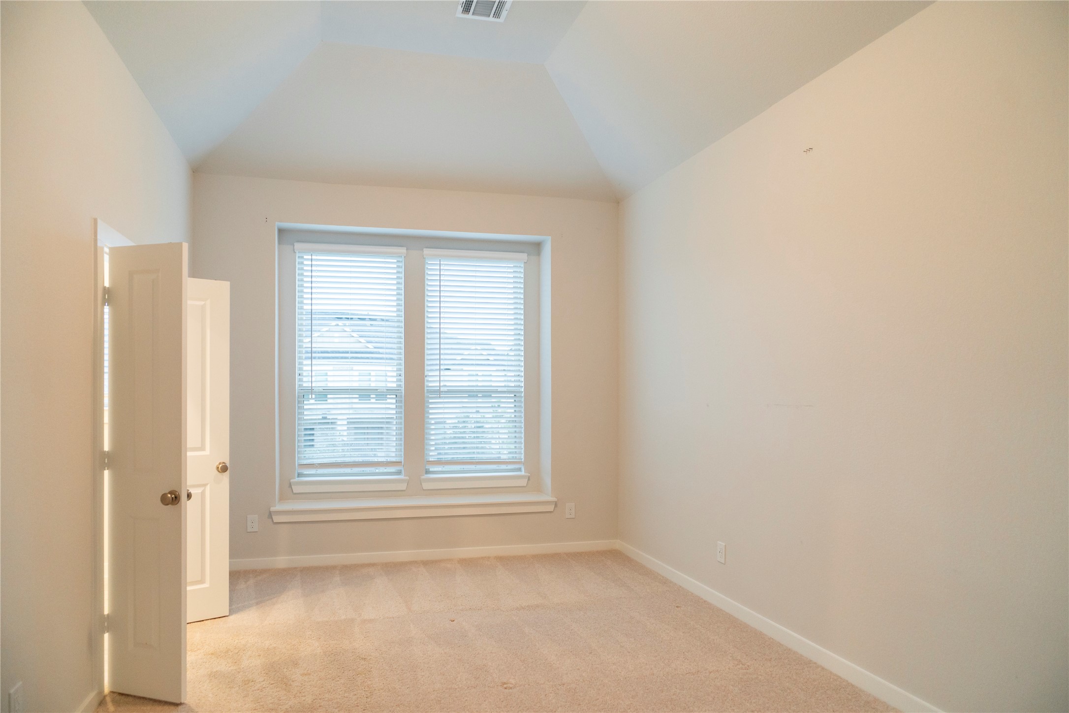 6519 Bramble Cv Lane Fulshear, TX 77441 - Photo 22 of 29 an empty room with windows