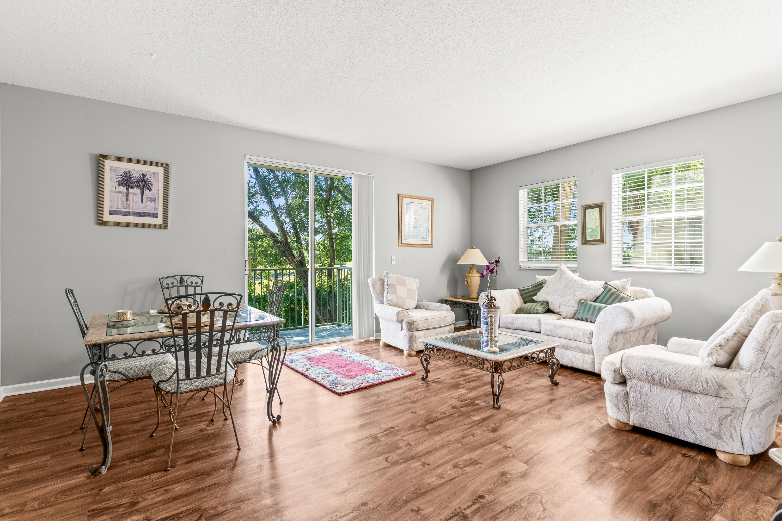 1951 Brandywine Road, Unit 59303 West Palm Beach, FL 33409 - Photo 25 of 25 a living room with furniture and a large window