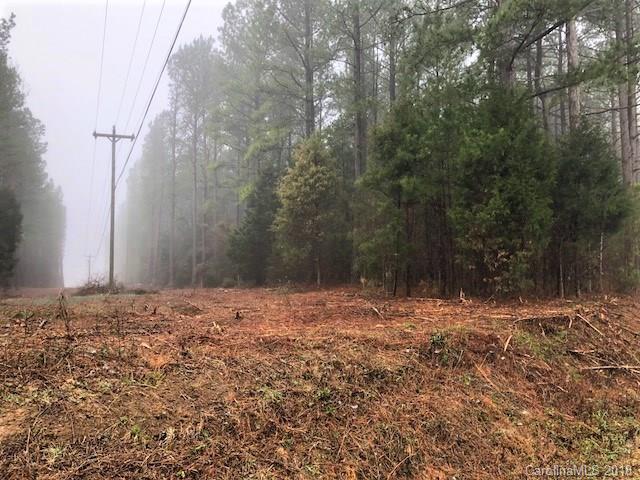 9400 Fisher Road Mount Pleasant, NC 28124 - Photo 3 of 6 a view of a yard with trees