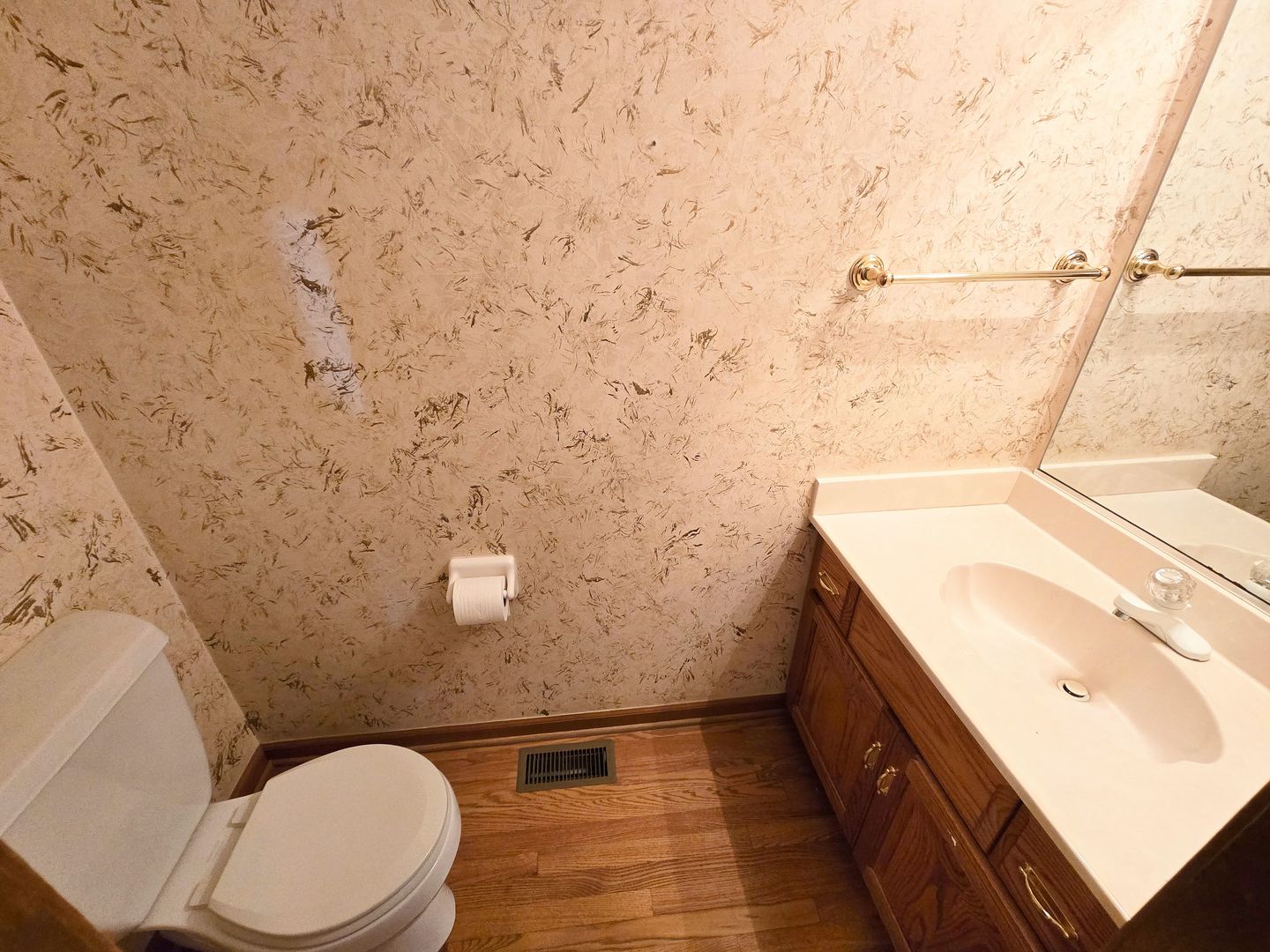 2286 Brookside Lane Aurora, IL 60502 - Photo 18 of 32 a bathroom with a granite countertop sink and a toilet