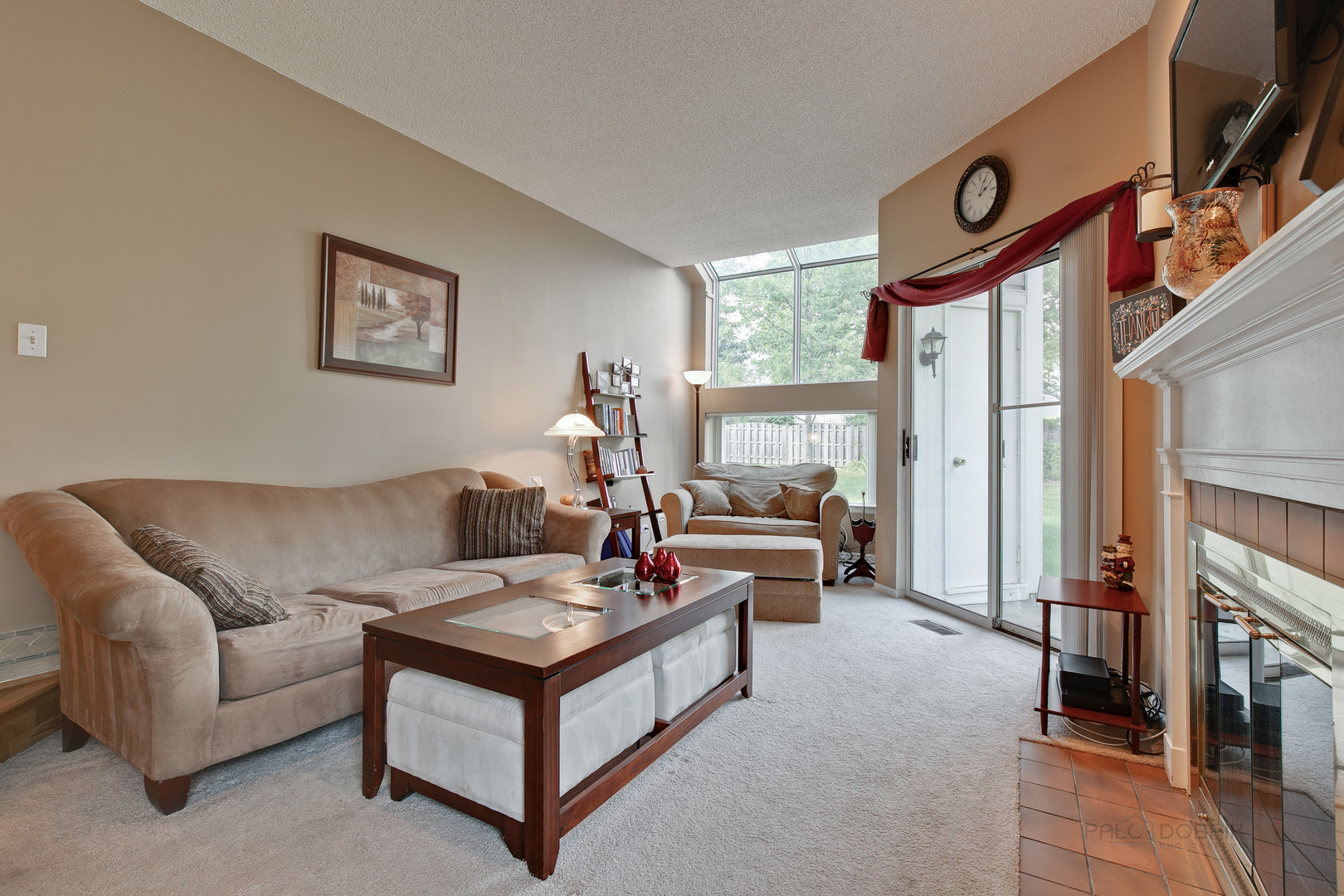 1271 Ranchview Court Buffalo Grove, IL 60089 - Photo 12 of 25 a living room with furniture and a fireplace