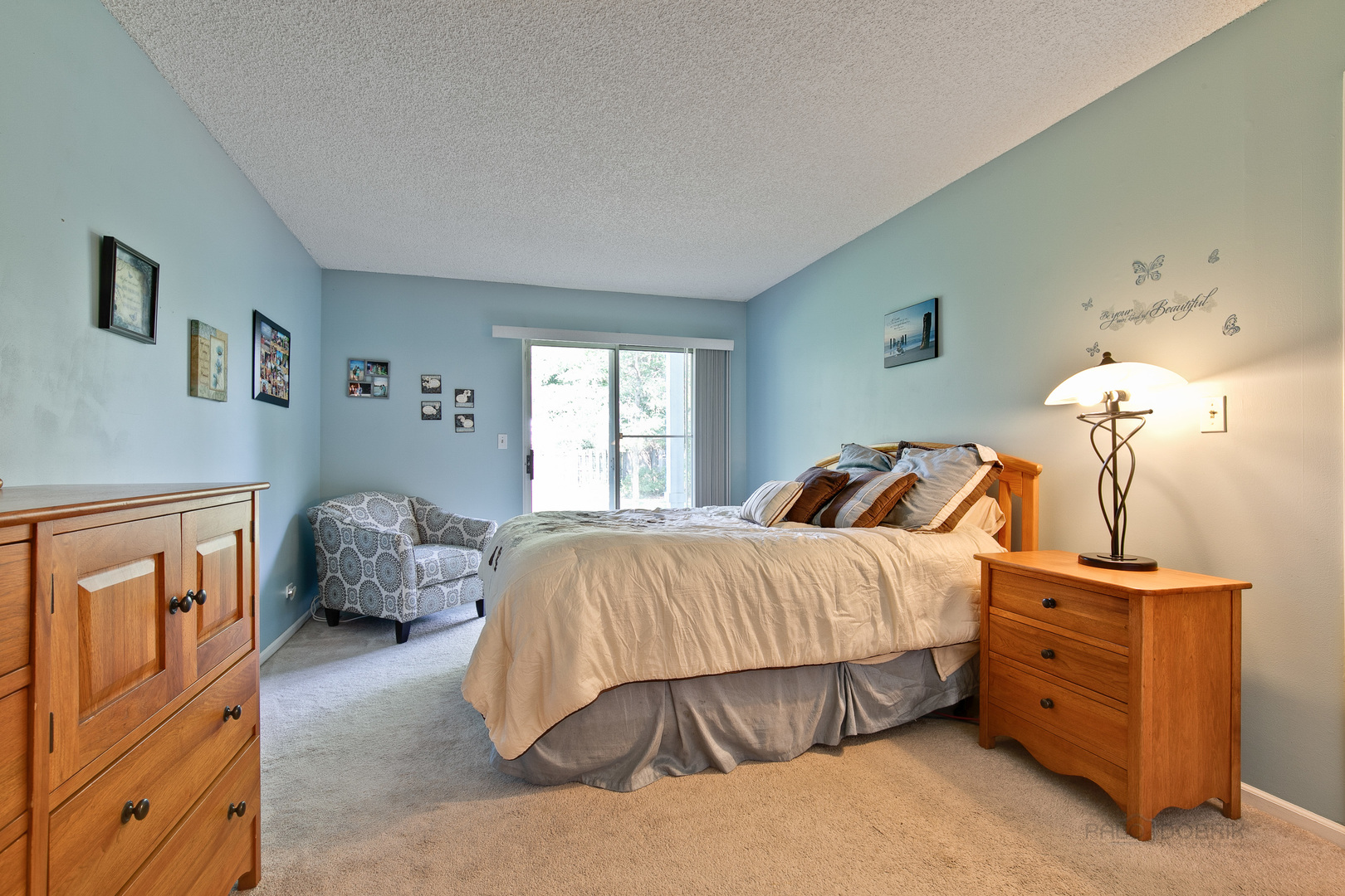 1271 Ranchview Court Buffalo Grove, IL 60089 - Photo 13 of 25 a bedroom with a bed and a dresser