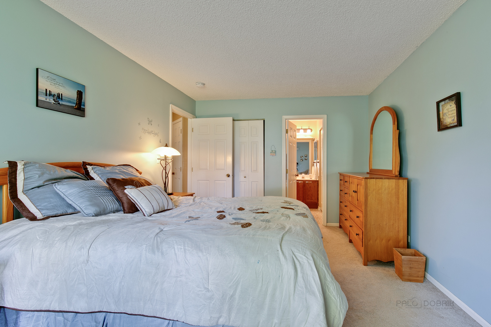 1271 Ranchview Court Buffalo Grove, IL 60089 - Photo 14 of 25 a bedroom with a bed and a cabinets