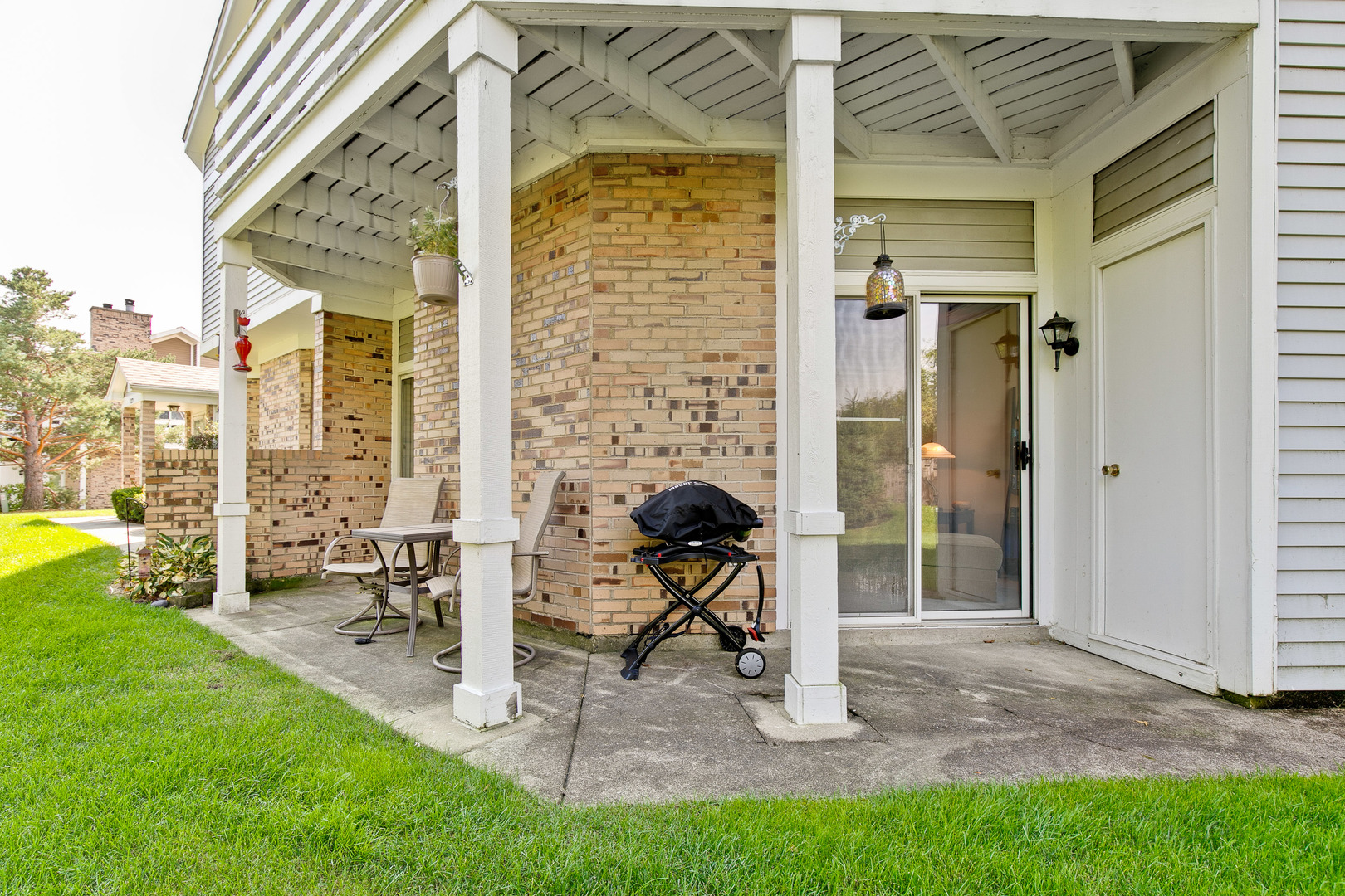 1271 Ranchview Court Buffalo Grove, IL 60089 - Photo 21 of 25 a view of balcony with two chairs and a table