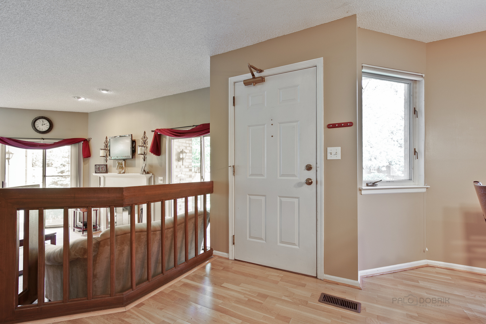 1271 Ranchview Court Buffalo Grove, IL 60089 - Photo 4 of 25 a view of an entryway with wooden floor