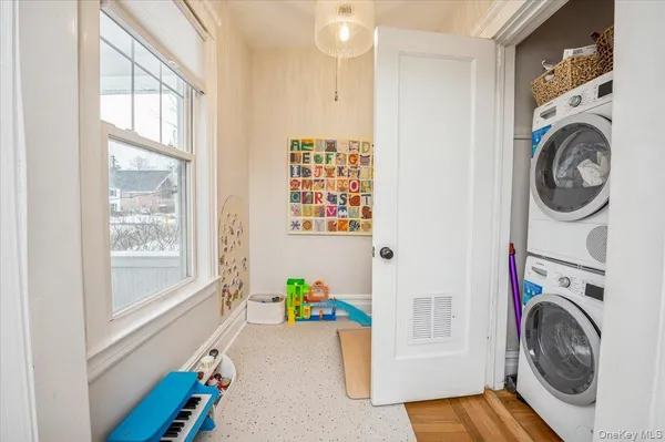 a view of a city from a dining room with large windows