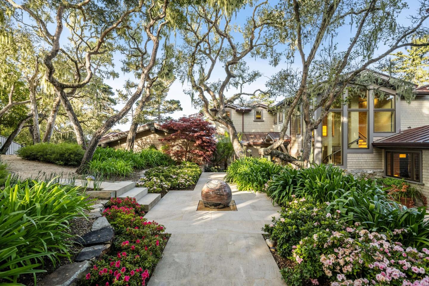3204 Palmero Way Pebble Beach, CA 93953 - Photo 5 of 93 a view of a garden with a fountain