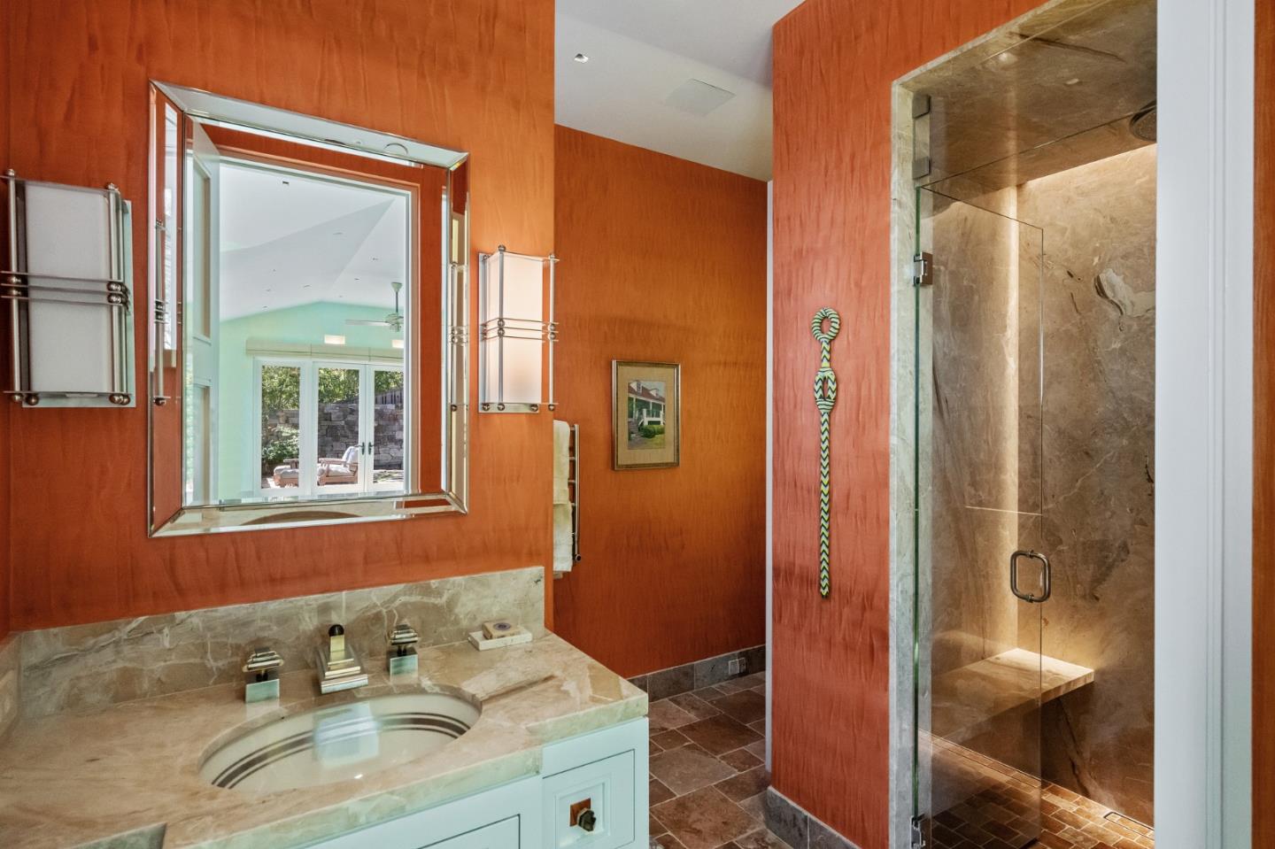 3204 Palmero Way Pebble Beach, CA 93953 - Photo 59 of 93 a bathroom with a sink and a mirror