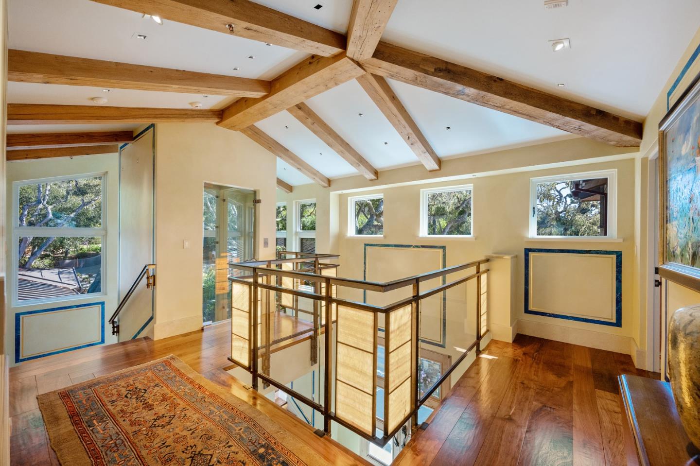 3204 Palmero Way Pebble Beach, CA 93953 - Photo 70 of 93 a view of a hallway with wooden floor and furniture