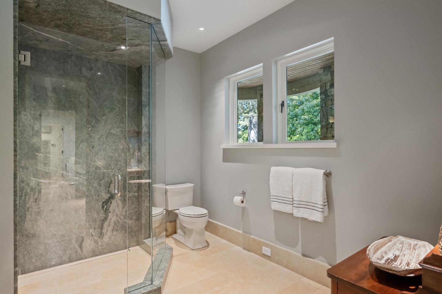 3204 Palmero Way Pebble Beach, CA 93953 - Photo 86 of 93 a bathroom with a toilet a sink and a shower