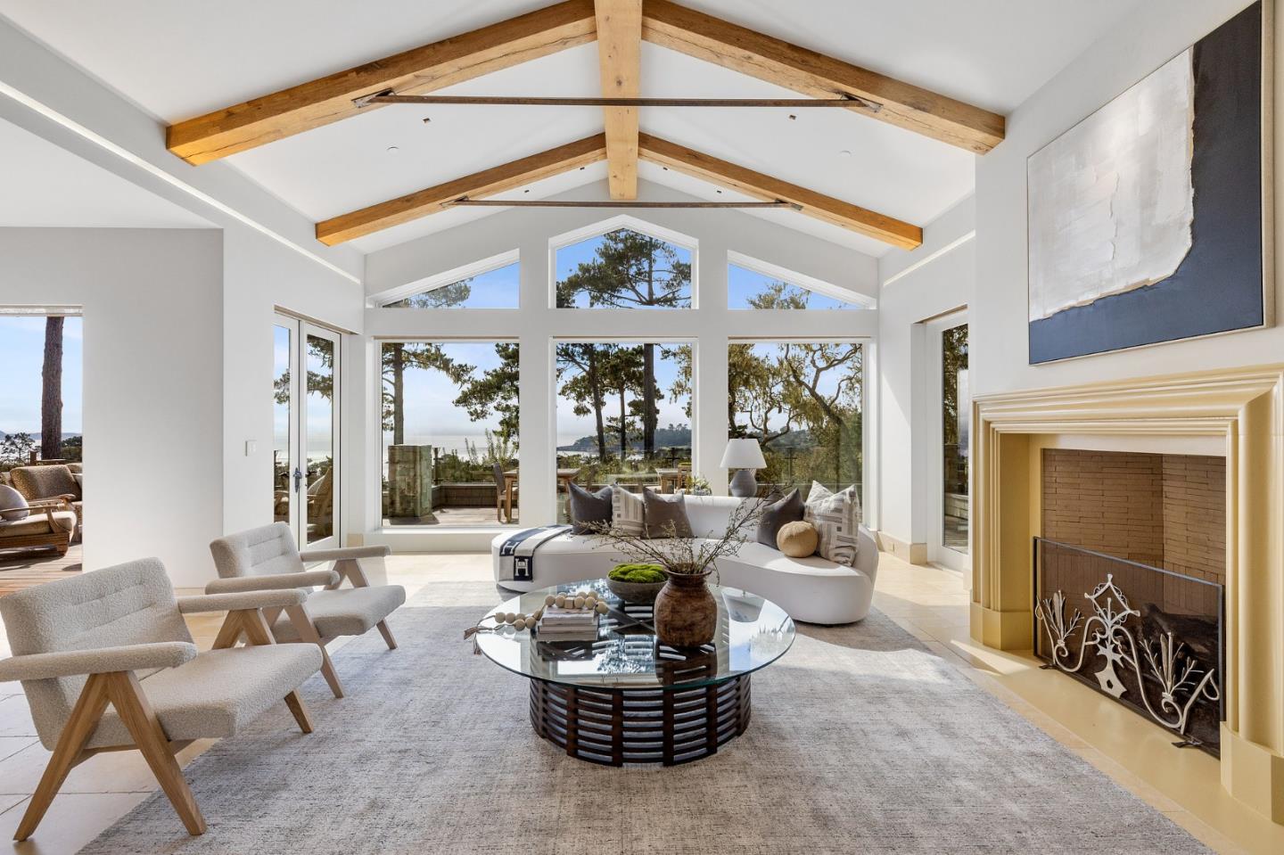 3204 Palmero Way Pebble Beach, CA 93953 - Photo 10 of 93 a living room with furniture a chandelier and a large window