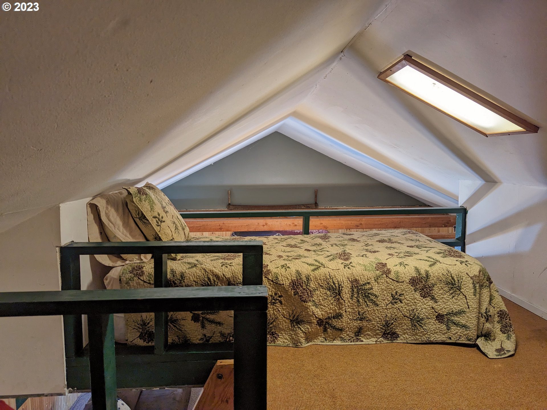 28084 Road 20 D Rhododendron, OR 97049 - Photo 27 of 32 a bed room with a bed