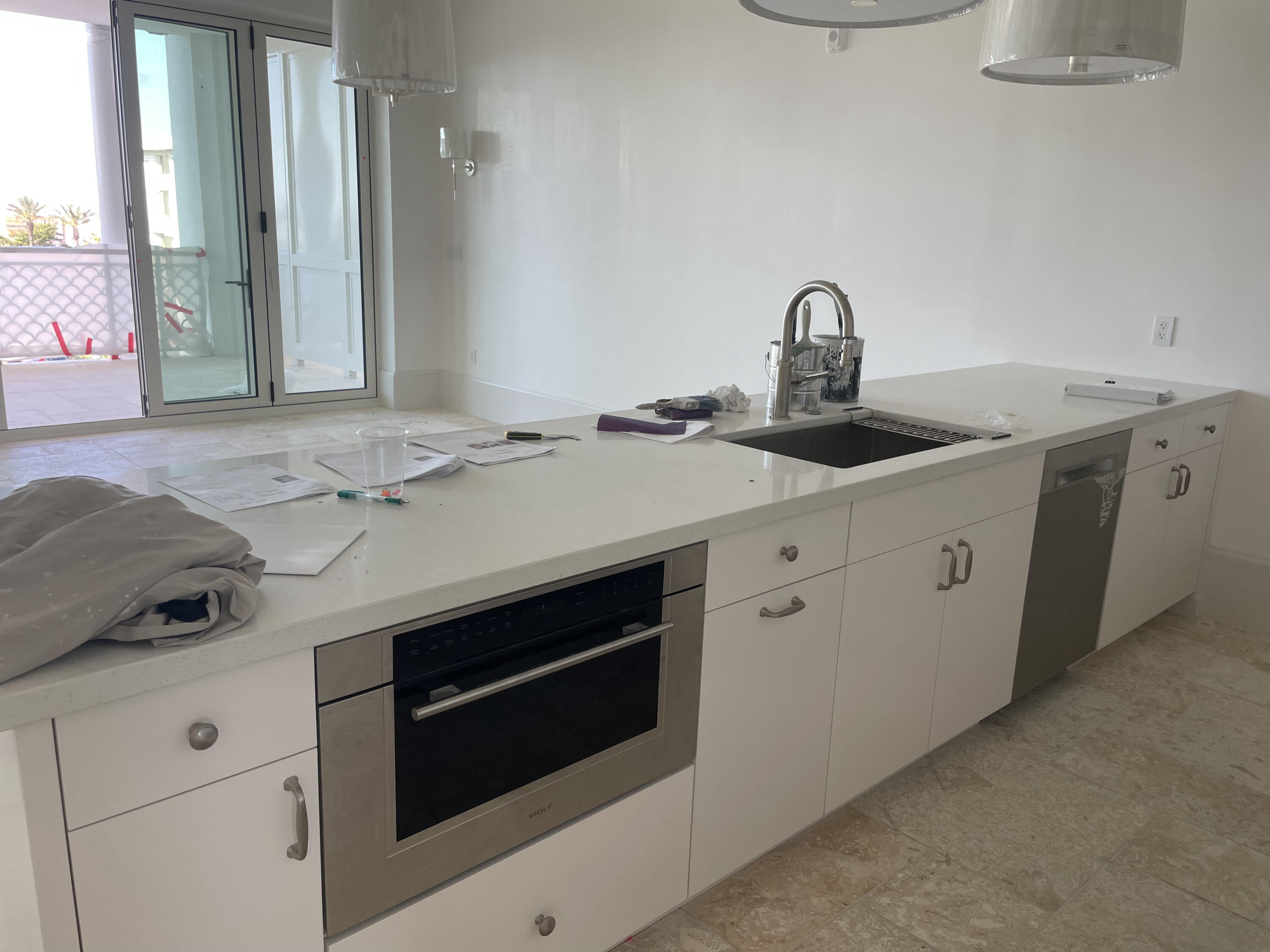 Tbd Tbd Admirality Row, Unit 303 Inlet Beach, FL 32461 - Photo 16 of 39 a kitchen with a sink stove and cabinets