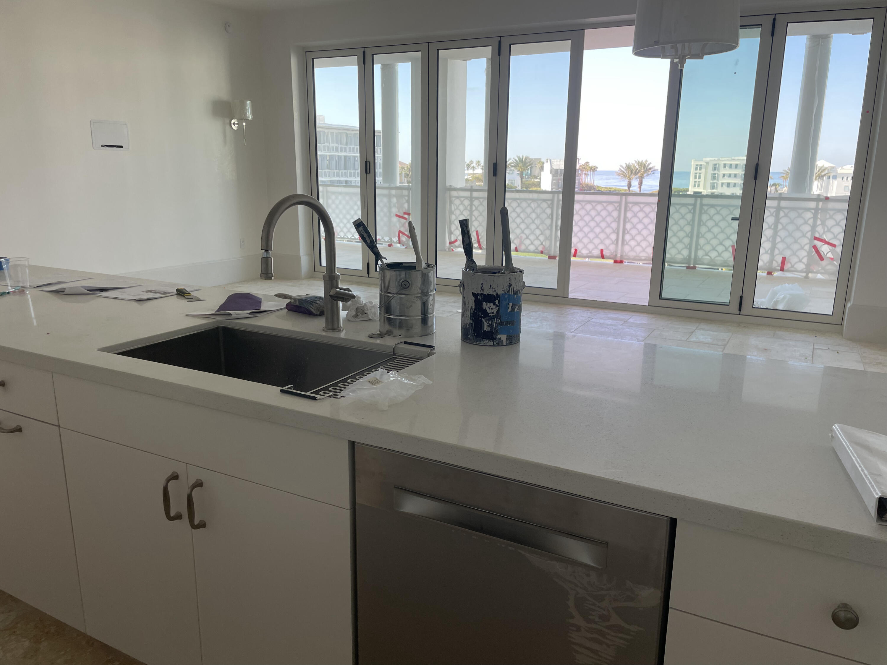 Tbd Tbd Admirality Row, Unit 303 Inlet Beach, FL 32461 - Photo 17 of 39 a kitchen with a sink and a large window