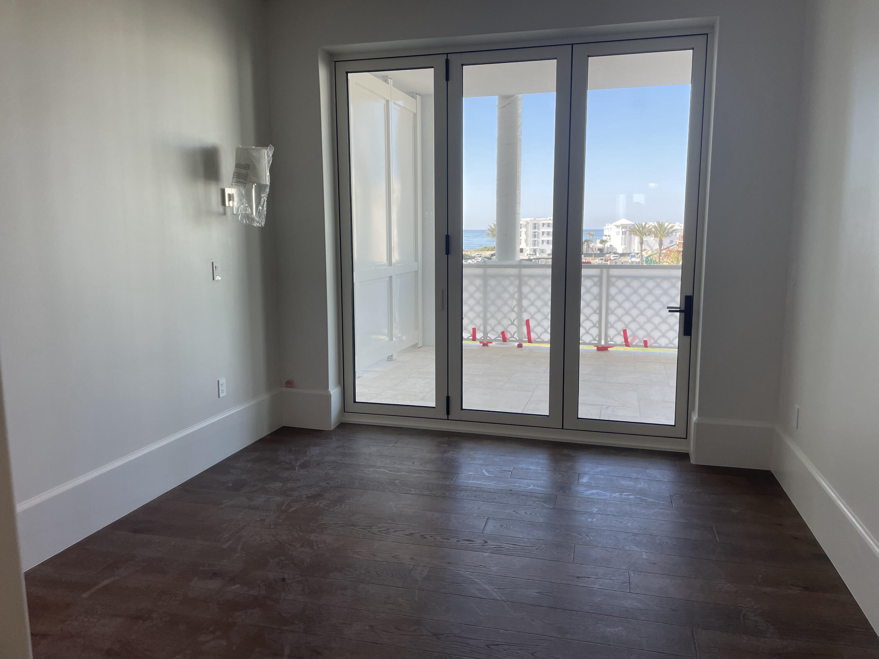 Tbd Tbd Admirality Row, Unit 303 Inlet Beach, FL 32461 - Photo 20 of 39 wooden floor in an empty room with a window