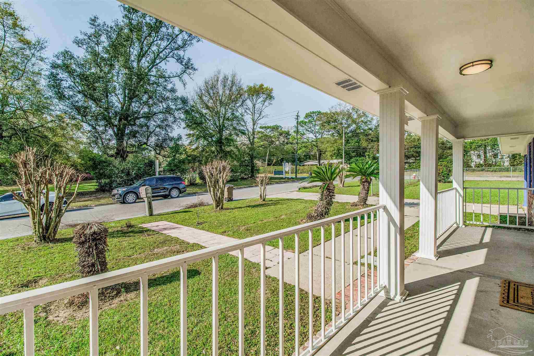 100 Mango Street Pensacola, FL 32503 - Photo 46 of 47 a view of a porch and garden