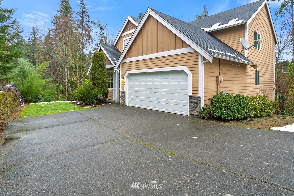 5306 Northeast 11th Court Renton, WA 98059 - Photo 2 of 27 a view of a house with a street