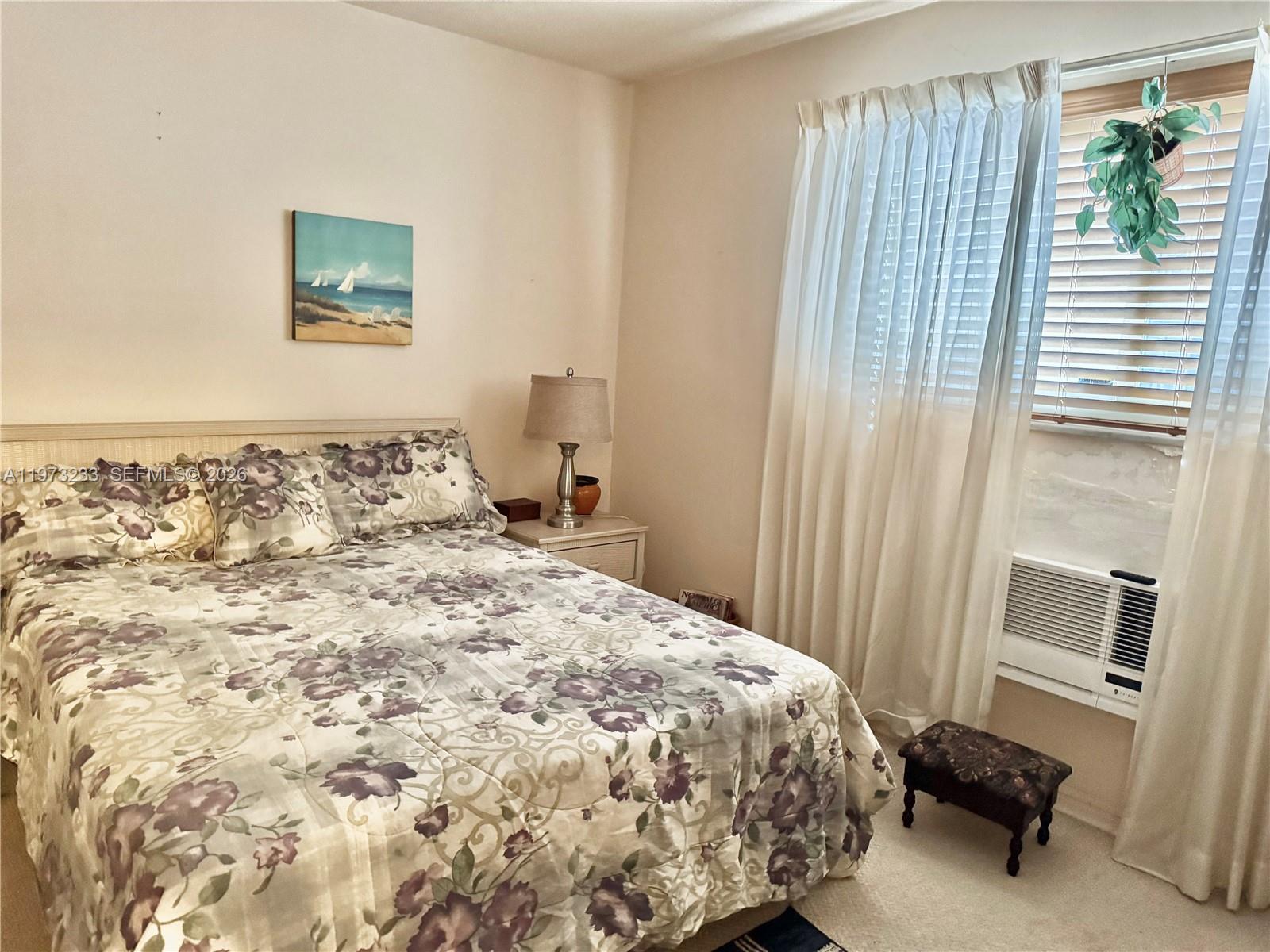 3500 Harrison Street, Unit 7 Hollywood, FL 33021 - Photo 14 of 66 a bedroom with a bed and a window