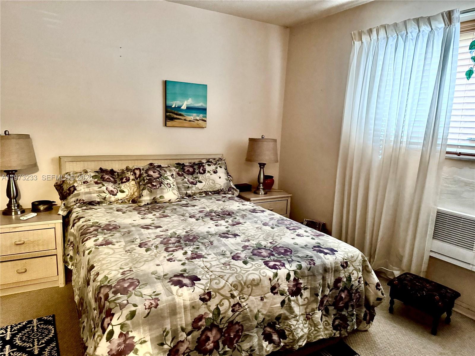 3500 Harrison Street, Unit 7 Hollywood, FL 33021 - Photo 15 of 66 a bedroom with a bed and a window