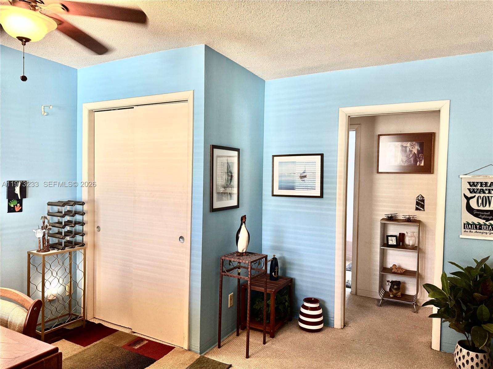 3500 Harrison Street, Unit 7 Hollywood, FL 33021 - Photo 36 of 66 a view of a livingroom with workspace and a window