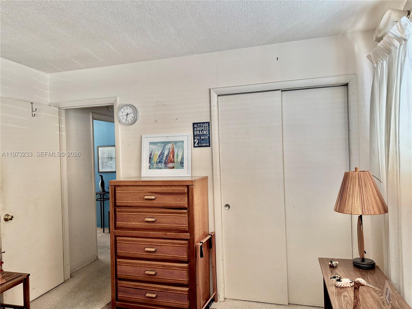 3500 Harrison Street, Unit 7 Hollywood, FL 33021 - Photo 39 of 66 a view of room with furniture and wooden floor