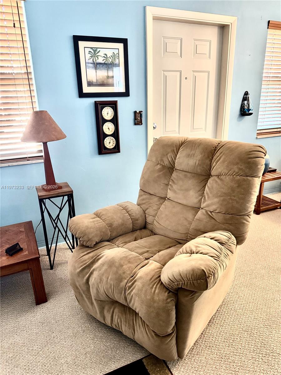 3500 Harrison Street, Unit 7 Hollywood, FL 33021 - Photo 48 of 66 a bed room with furniture and a window