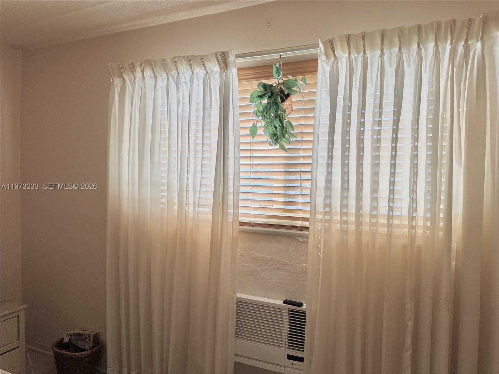 3500 Harrison Street, Unit 7 Hollywood, FL 33021 - Photo 57 of 66 a bathroom with a shower and a window