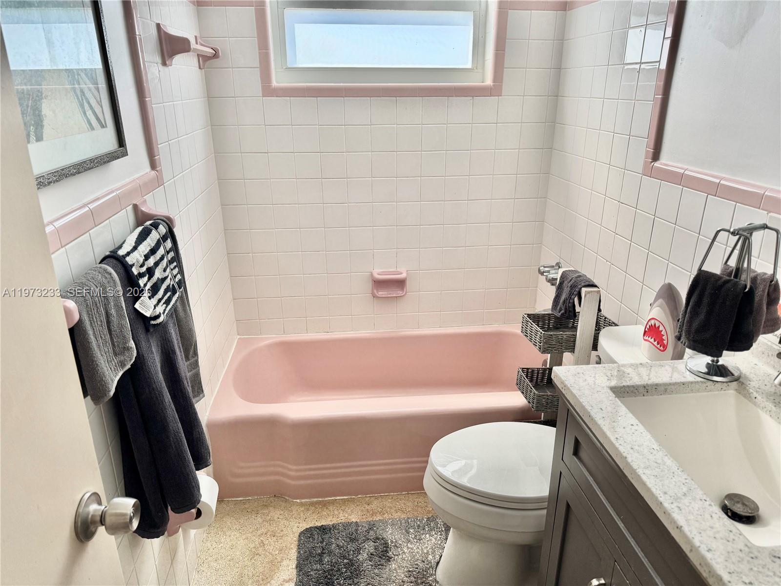 3500 Harrison Street, Unit 7 Hollywood, FL 33021 - Photo 60 of 66 a bathroom with a sink toilet and bathtub