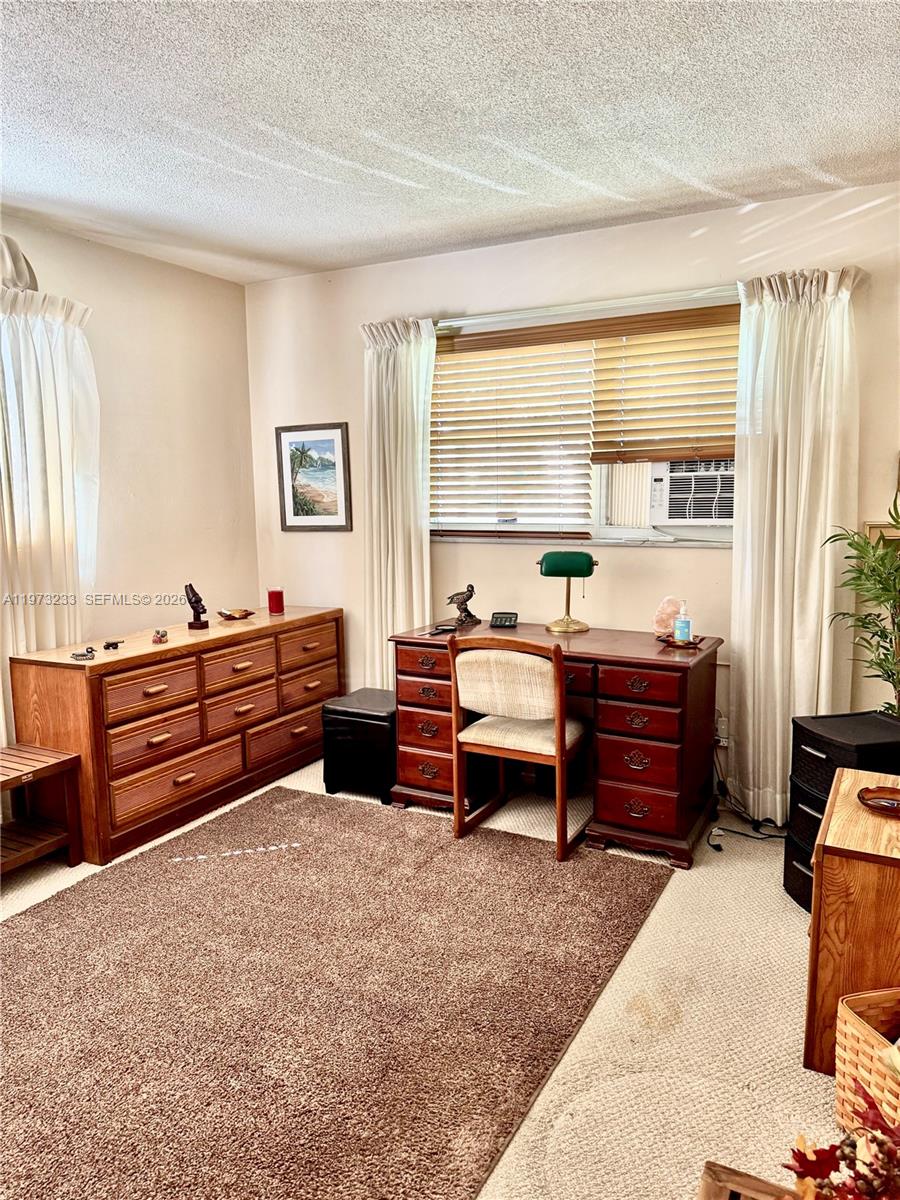 3500 Harrison Street, Unit 7 Hollywood, FL 33021 - Photo 66 of 66 a room with furniture and a large window
