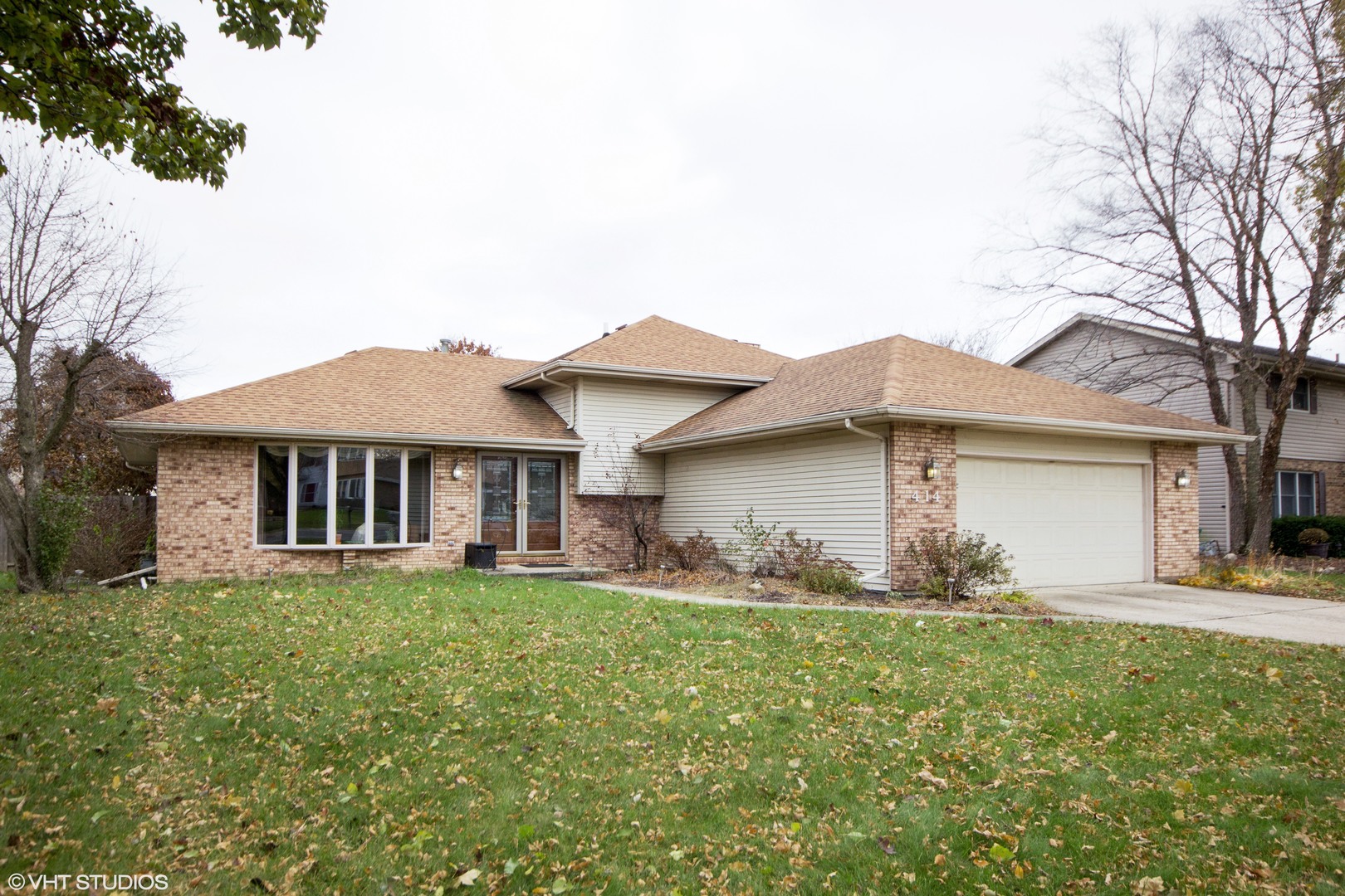 414 South Raven Road Shorewood, IL 60404 - Photo 1 of 15 front view of a house with a yard