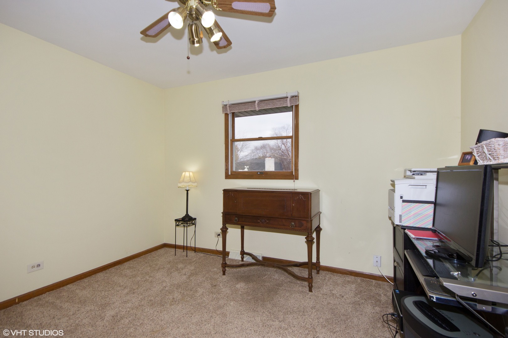 414 South Raven Road Shorewood, IL 60404 - Photo 11 of 15 a view of a workspace with furniture and a window