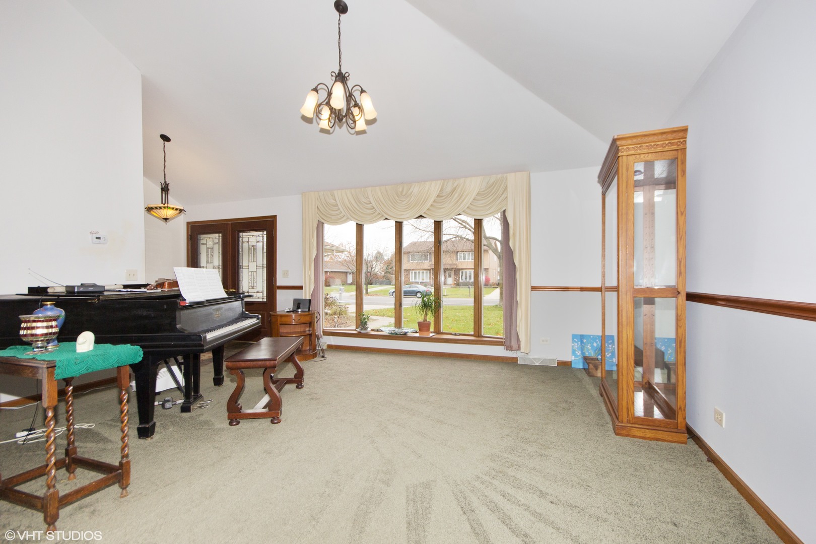 414 South Raven Road Shorewood, IL 60404 - Photo 2 of 15 a view of a livingroom with furniture and a window