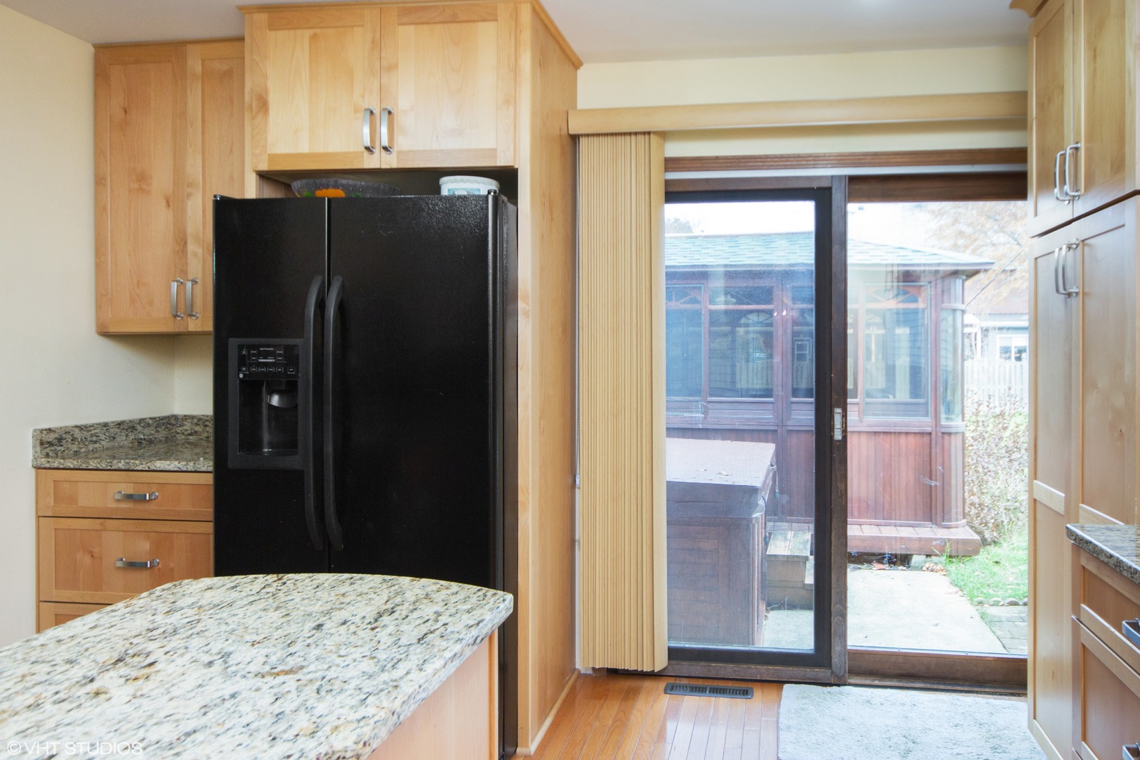 414 South Raven Road Shorewood, IL 60404 - Photo 6 of 15 a kitchen with a refrigerator and a tub