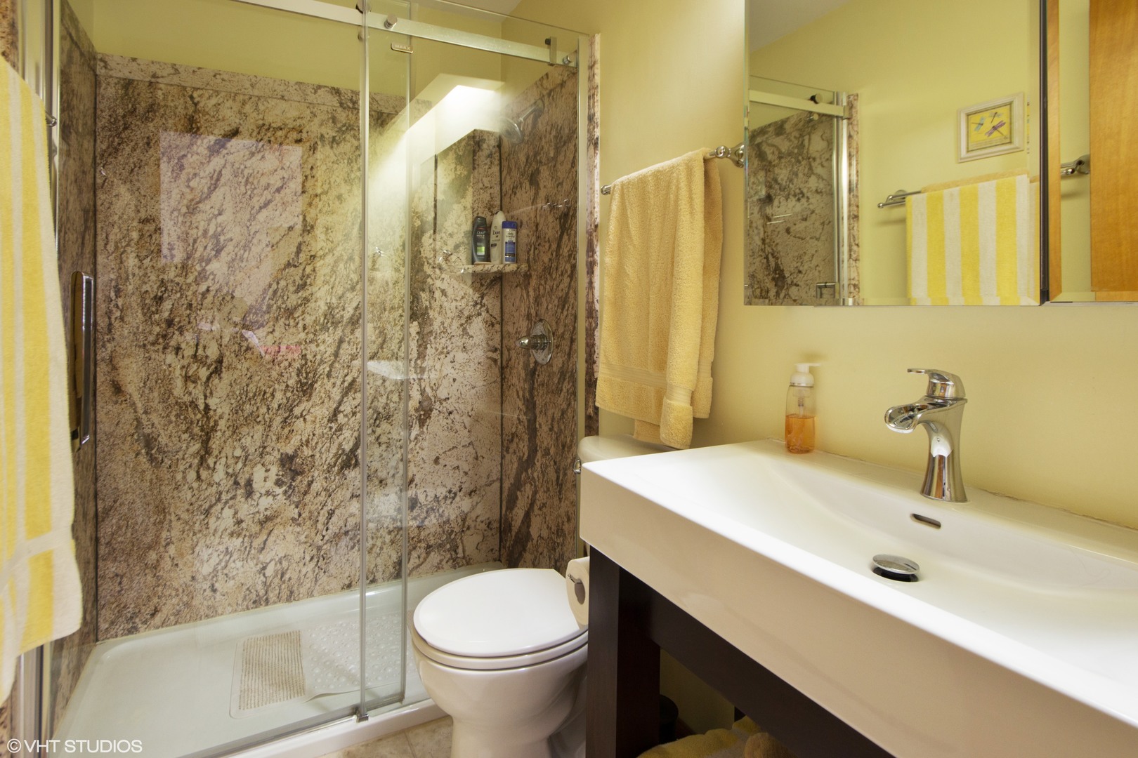 414 South Raven Road Shorewood, IL 60404 - Photo 10 of 15 a bathroom with a sink and a mirror
