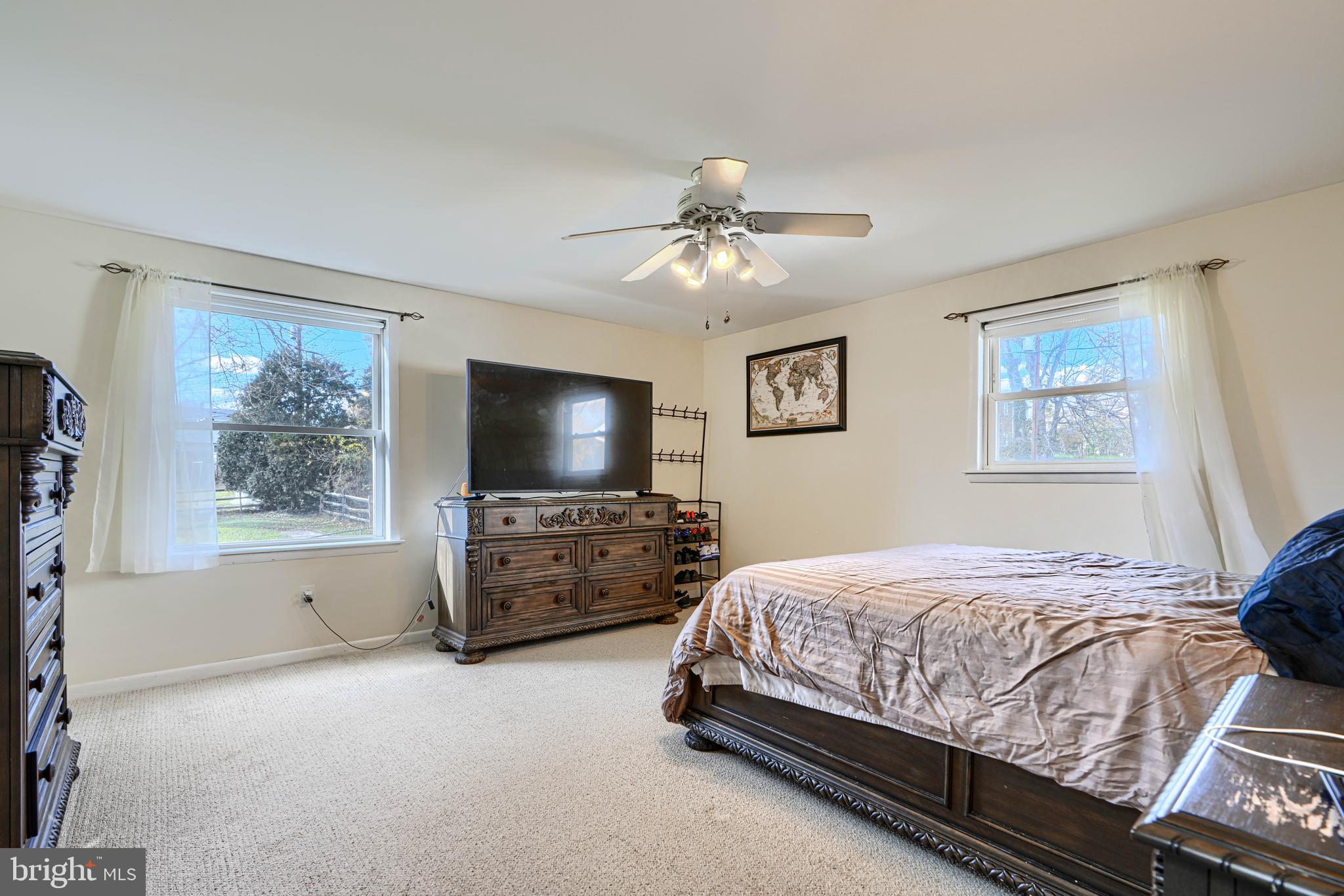 2110 Folkstone Road Lutherville-Timonium, MD 21093 - Photo 21 of 49 a bedroom with a bed and a flat screen tv
