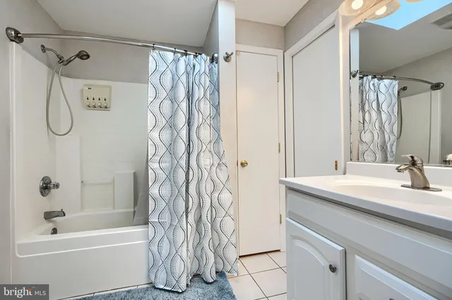 a bathroom with a sink and a bathtub