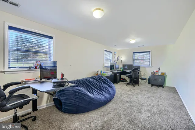 a room with furniture and a window