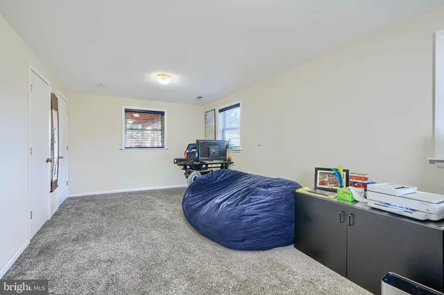 a room with a cabinets and couch