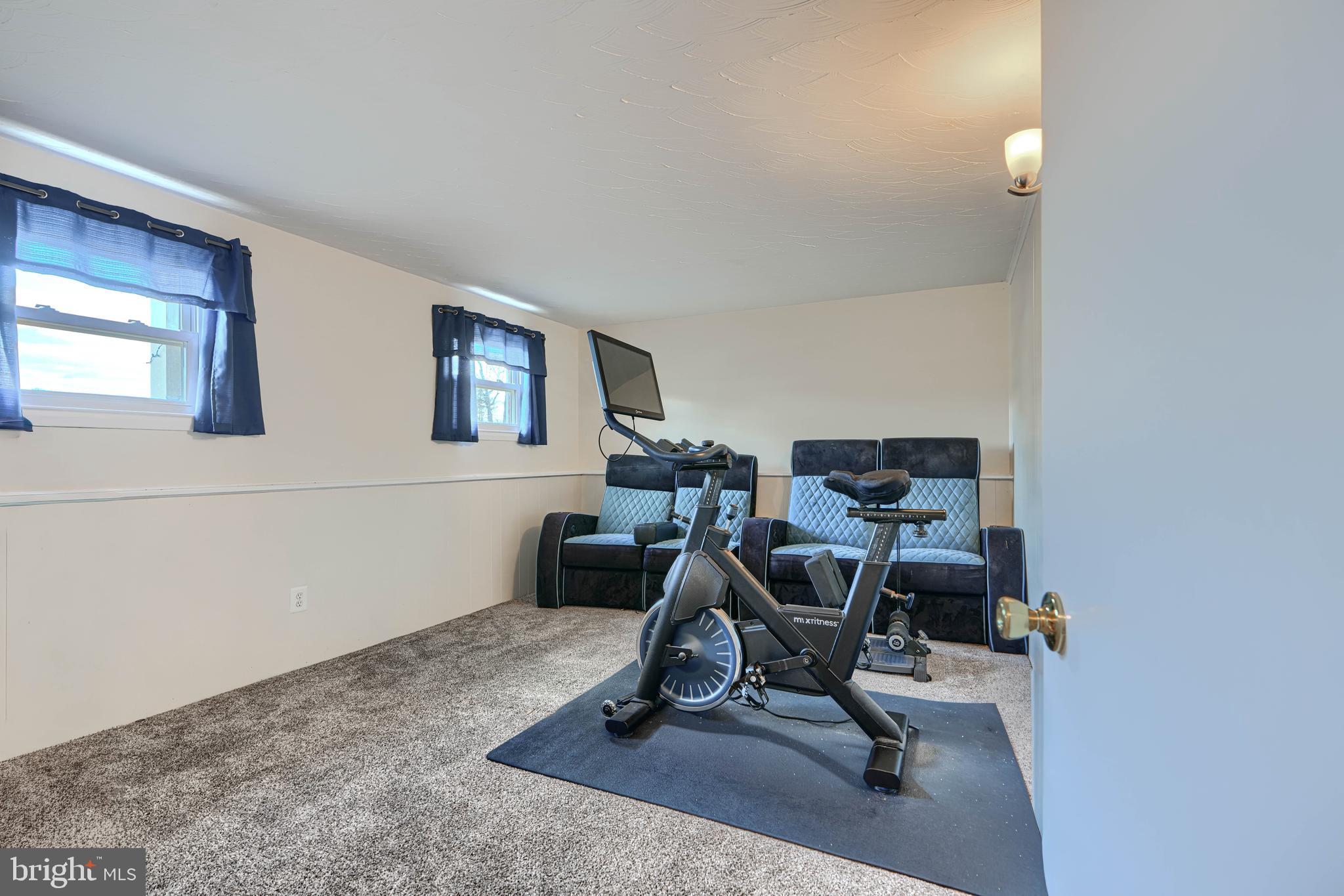 2110 Folkstone Road Lutherville-Timonium, MD 21093 - Photo 31 of 49 a view of a workspace with furniture and a window
